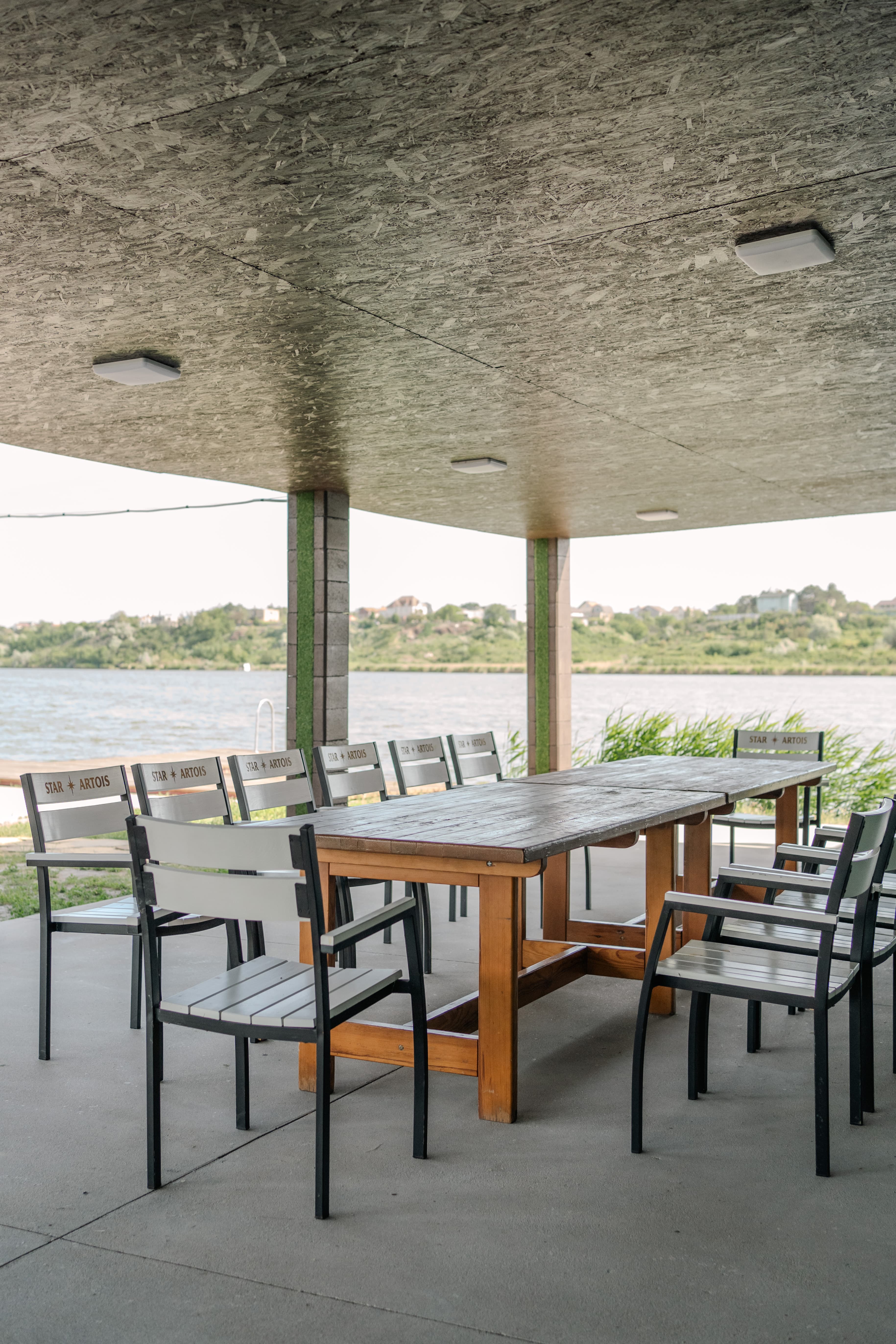 Restaurant terrace by the water at Dobryi Khutir